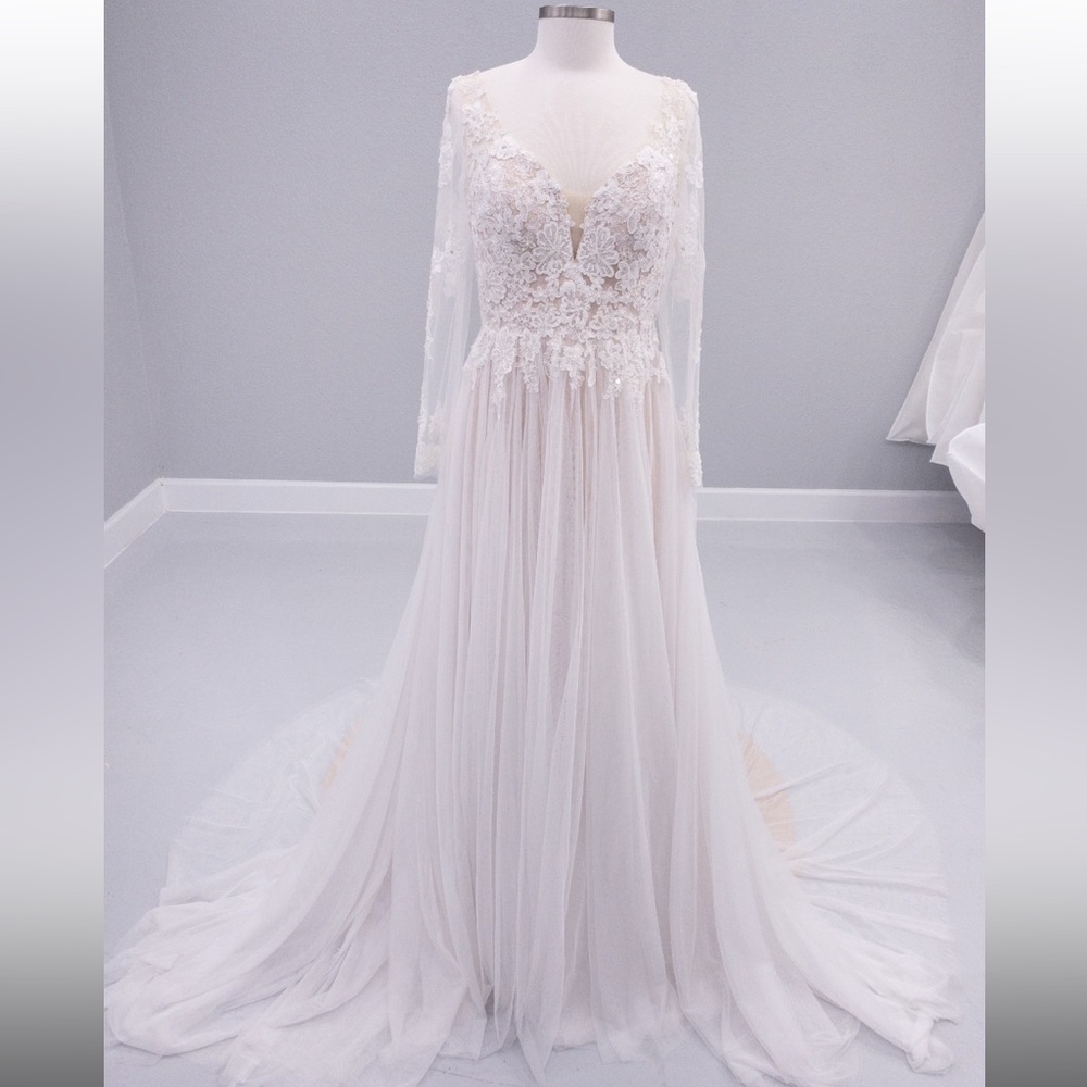 Beautiful Private label wedding dress with sleeves.